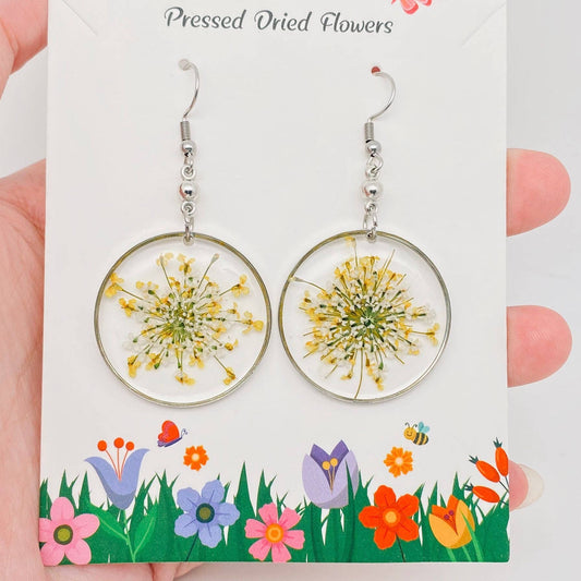 Boucles d'oreilles à pendentif rond avec fleurs séchées